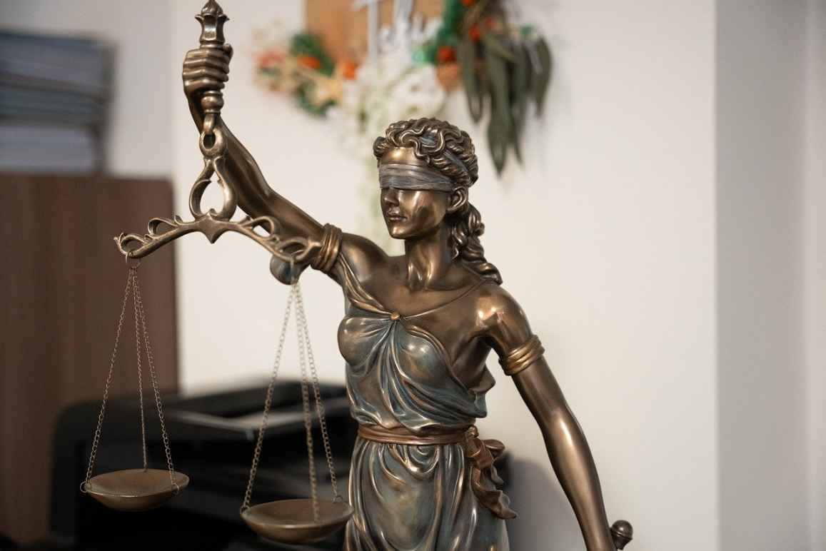 statue of lady justice and her scales